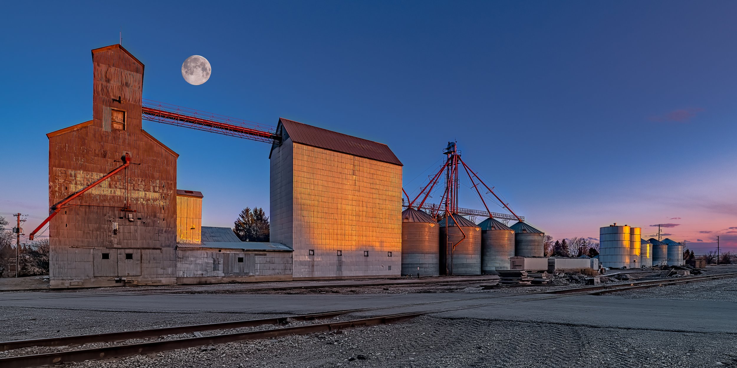 Full Moon Over a Ririe Sunset by Clay Cammack Photography